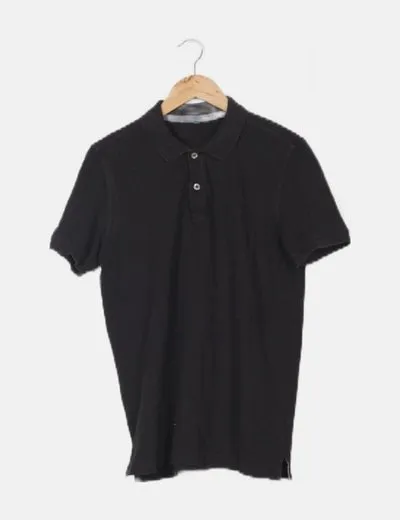 Basic black Benetton polo.