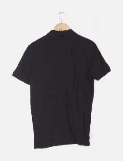 Basic black Benetton polo.